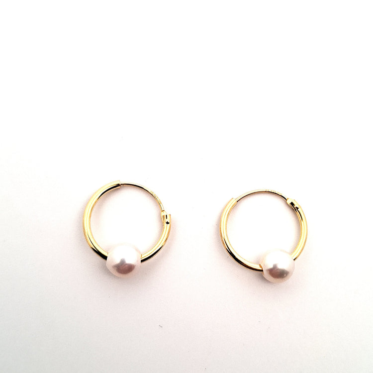 Gold tone pearl slider hoops