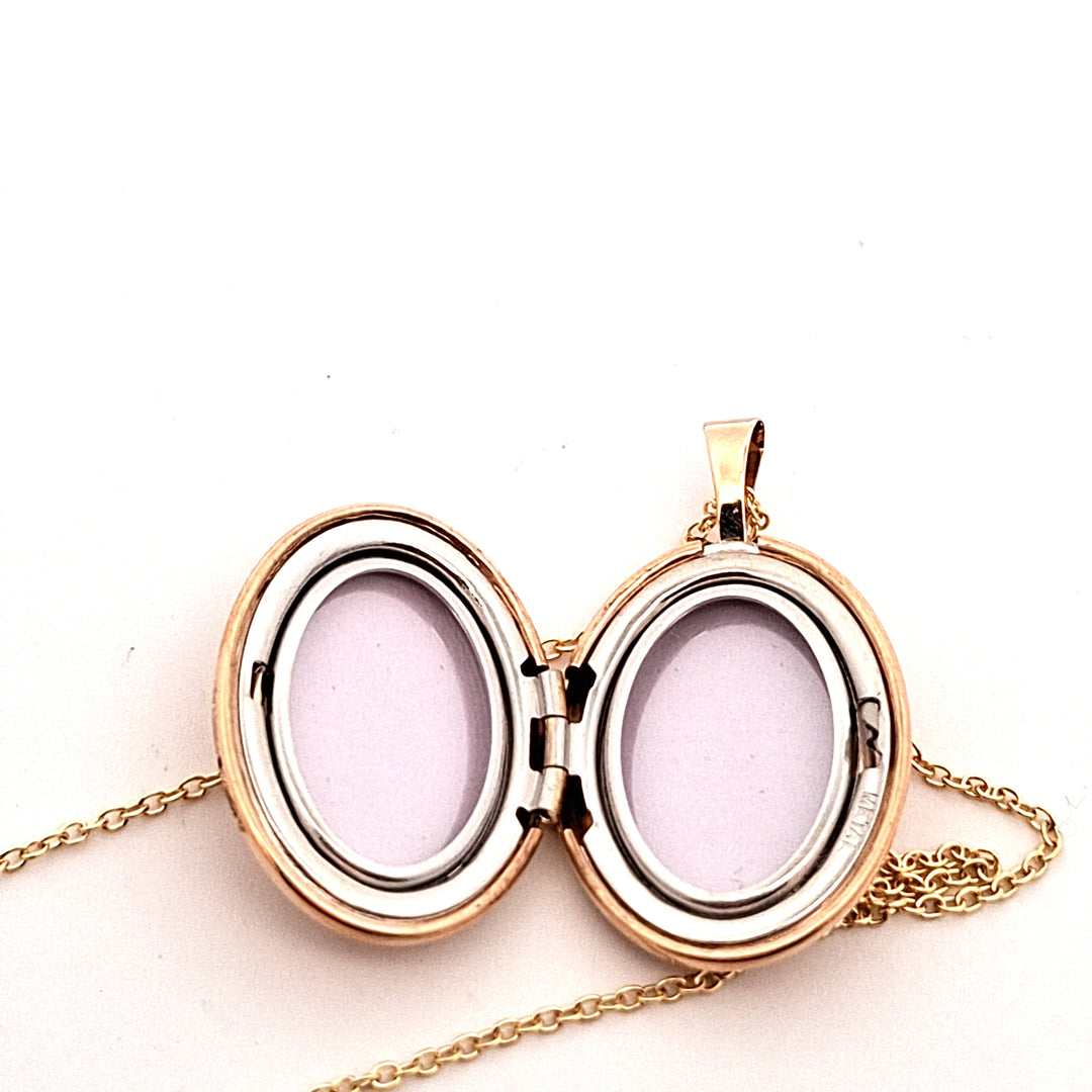 Gold Oval floral pattern locket 352