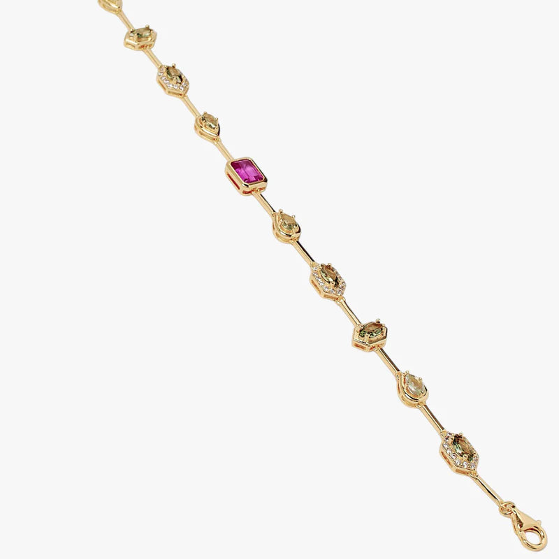 A gold chain bracelet featuring a central rectangular pink gemstone and multiple small round clear stones set in ornate gold links, shown on a plain light gray background.