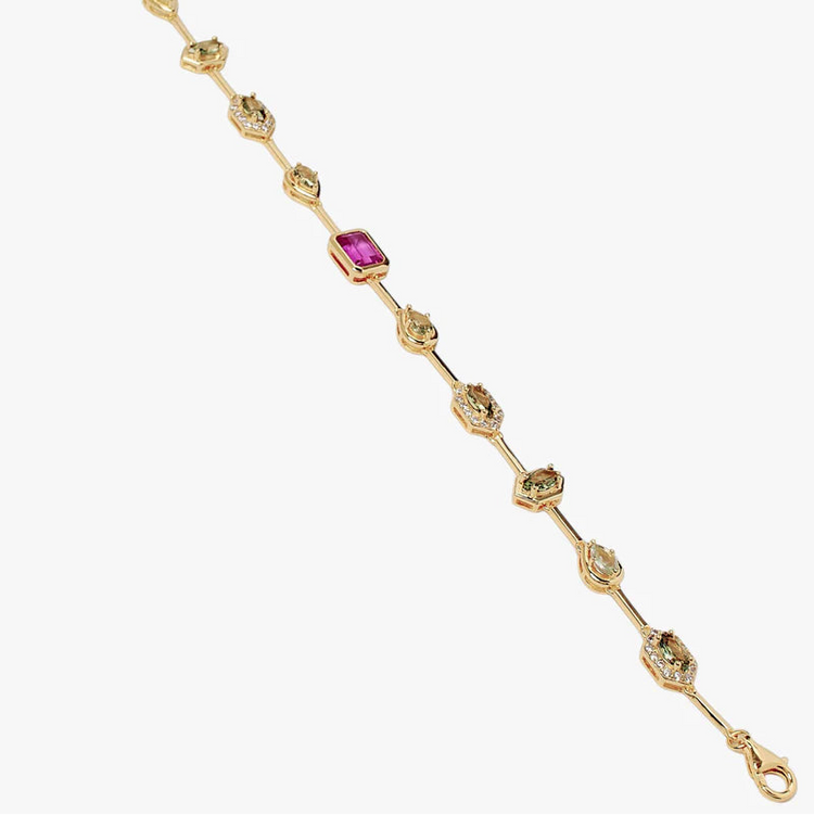 A gold chain bracelet featuring a central rectangular pink gemstone and multiple small round clear stones set in ornate gold links, shown on a plain light gray background.