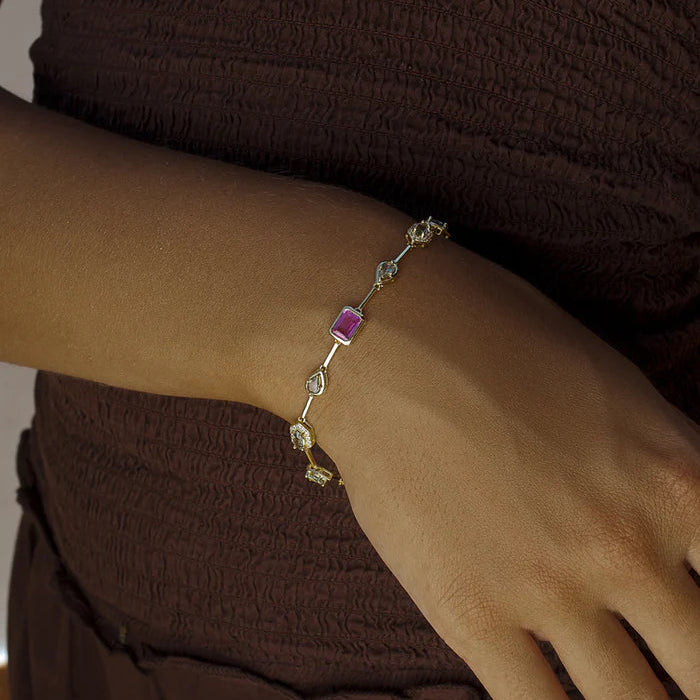 Gold tone linear fuchsia bracelet 38810
