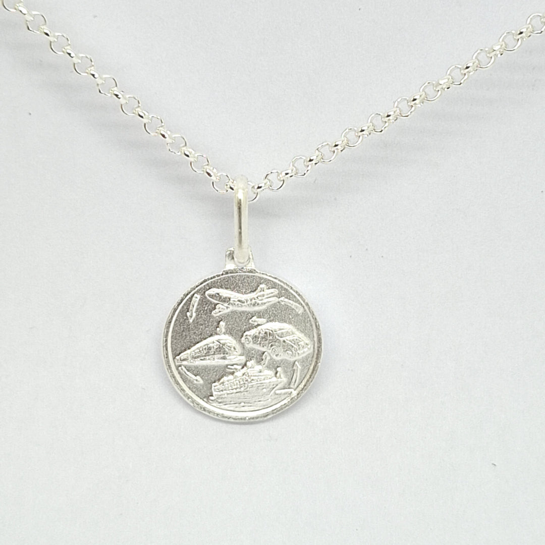 Silver necklace with a round pendant on a light gray background