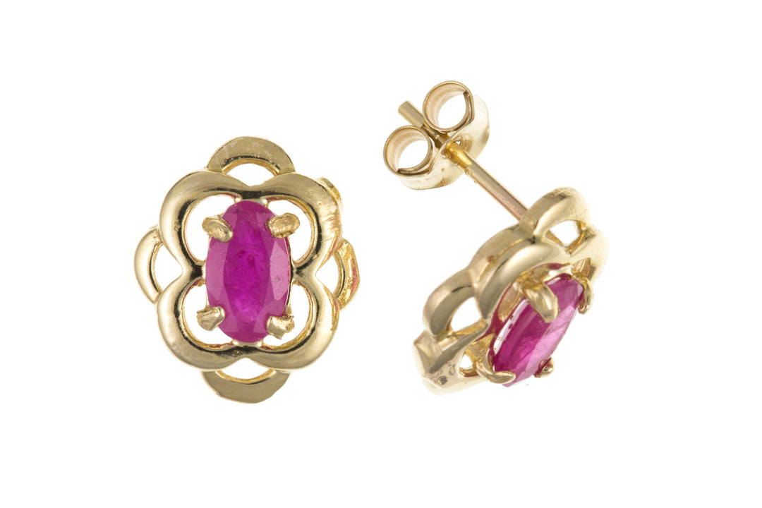 Gold stud earrings set with oval faceted Real Ruby stones 38278