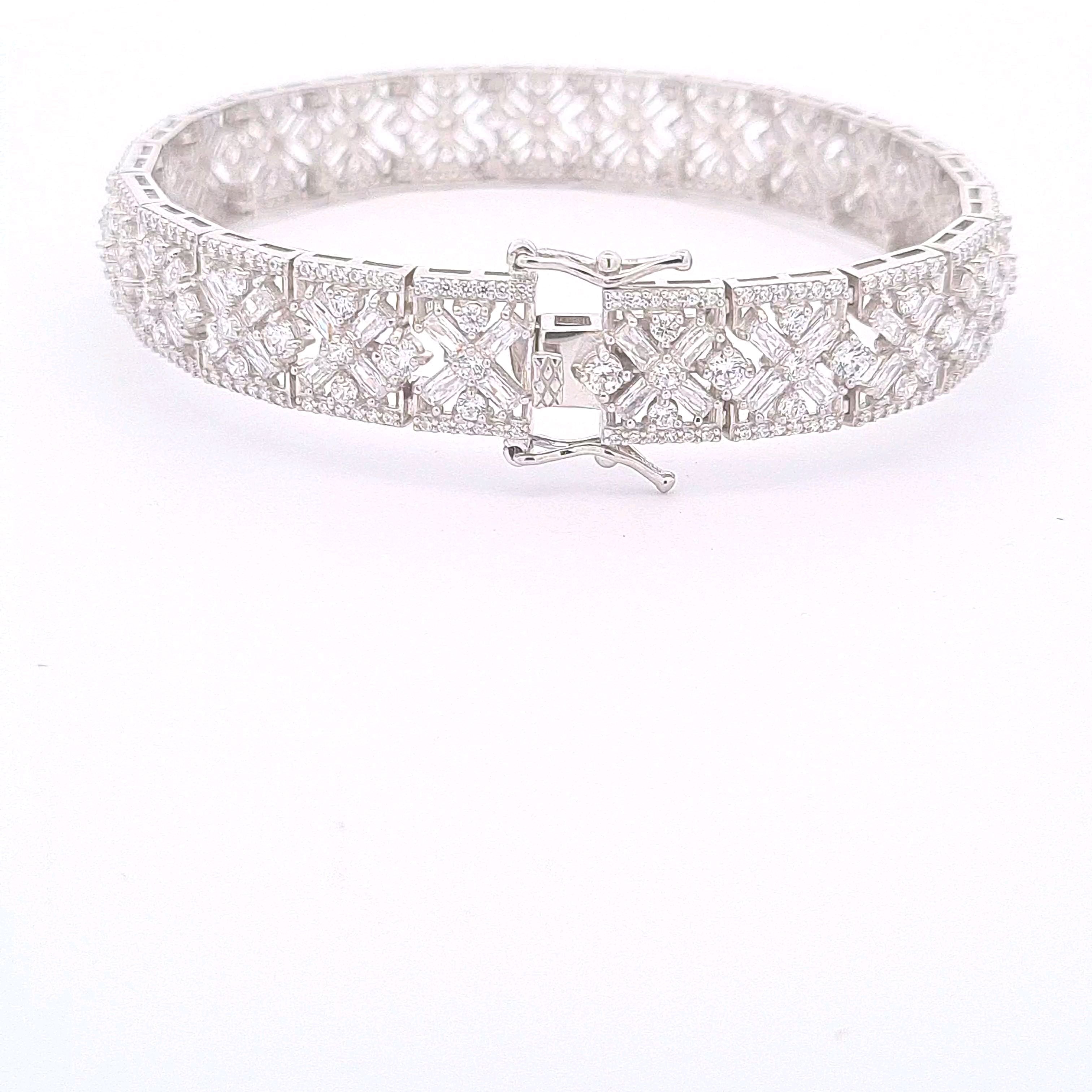 Sterling silver ornate multi stone CZ set panel bracelet with double figure of eight safety catch. 33860 - Armin Lowe Jewellers