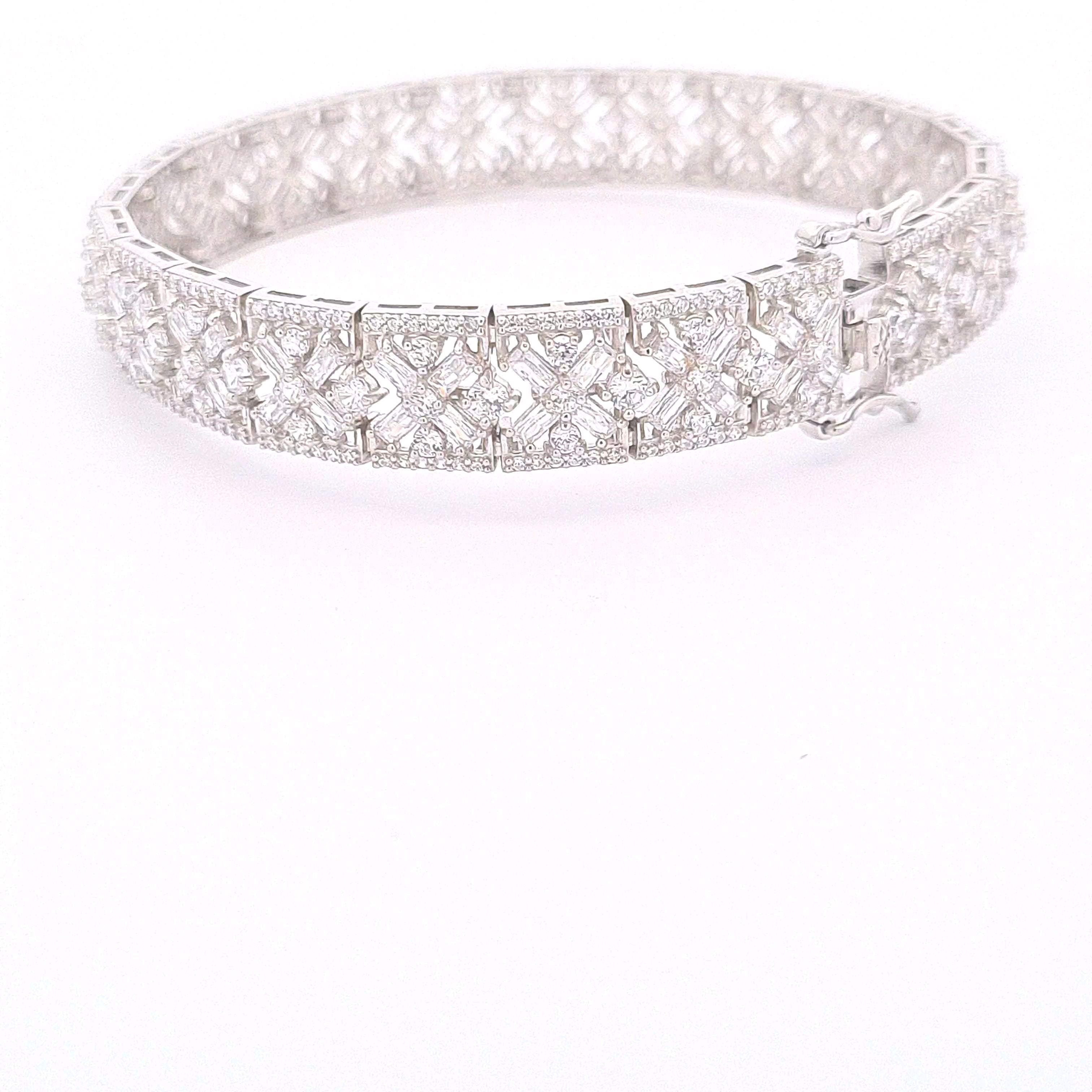 Sterling silver ornate multi stone CZ set panel bracelet with double figure of eight safety catch. 33860 - Armin Lowe Jewellers