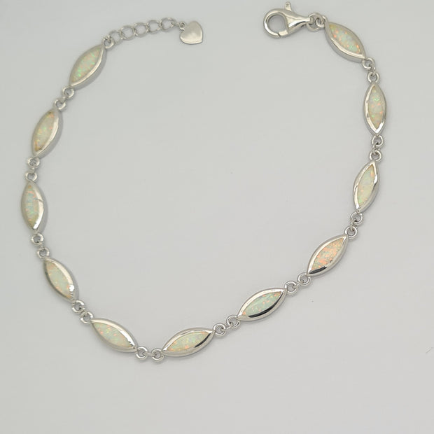 Sterling silver marquise link Syn Opal set bracelet. 34677