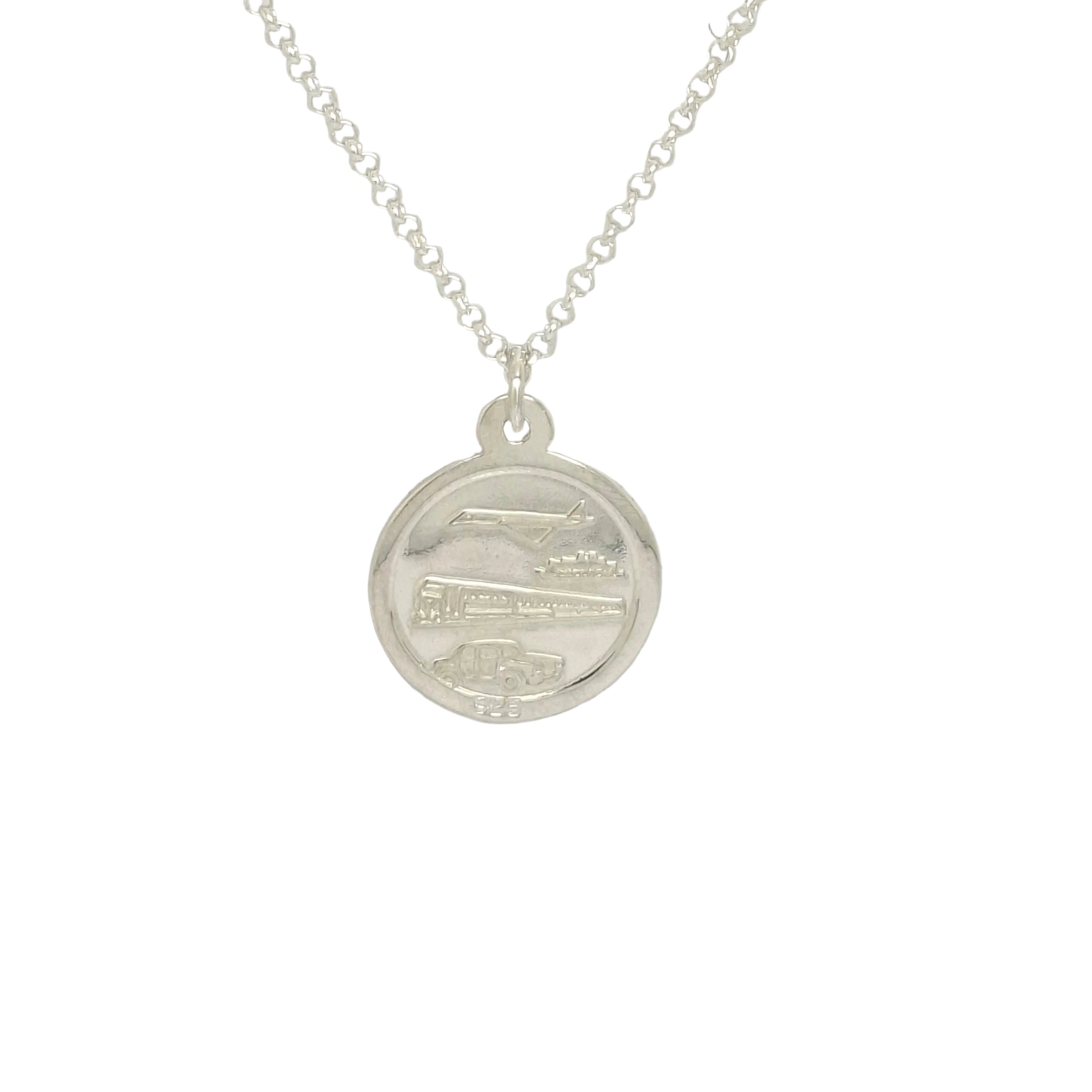 Silver necklace with a round pendant on a light gray background