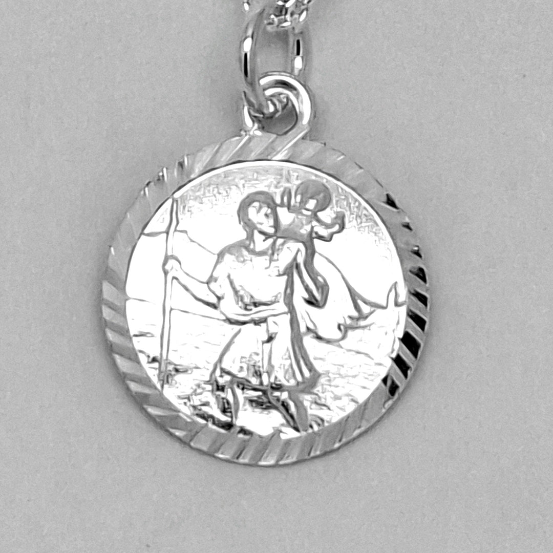 Silver pendant necklace on a gray background