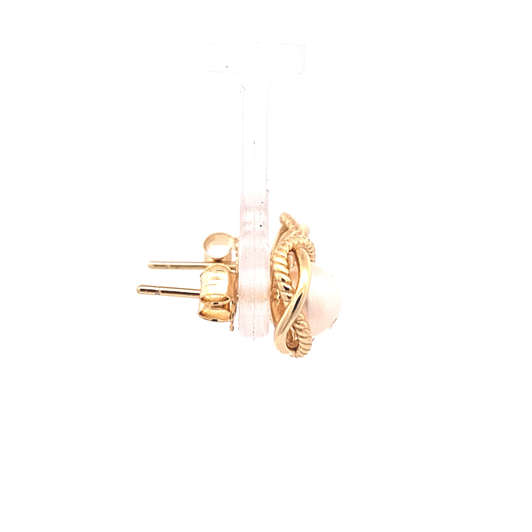 Gold toned fancy stud pearl earrings 38737