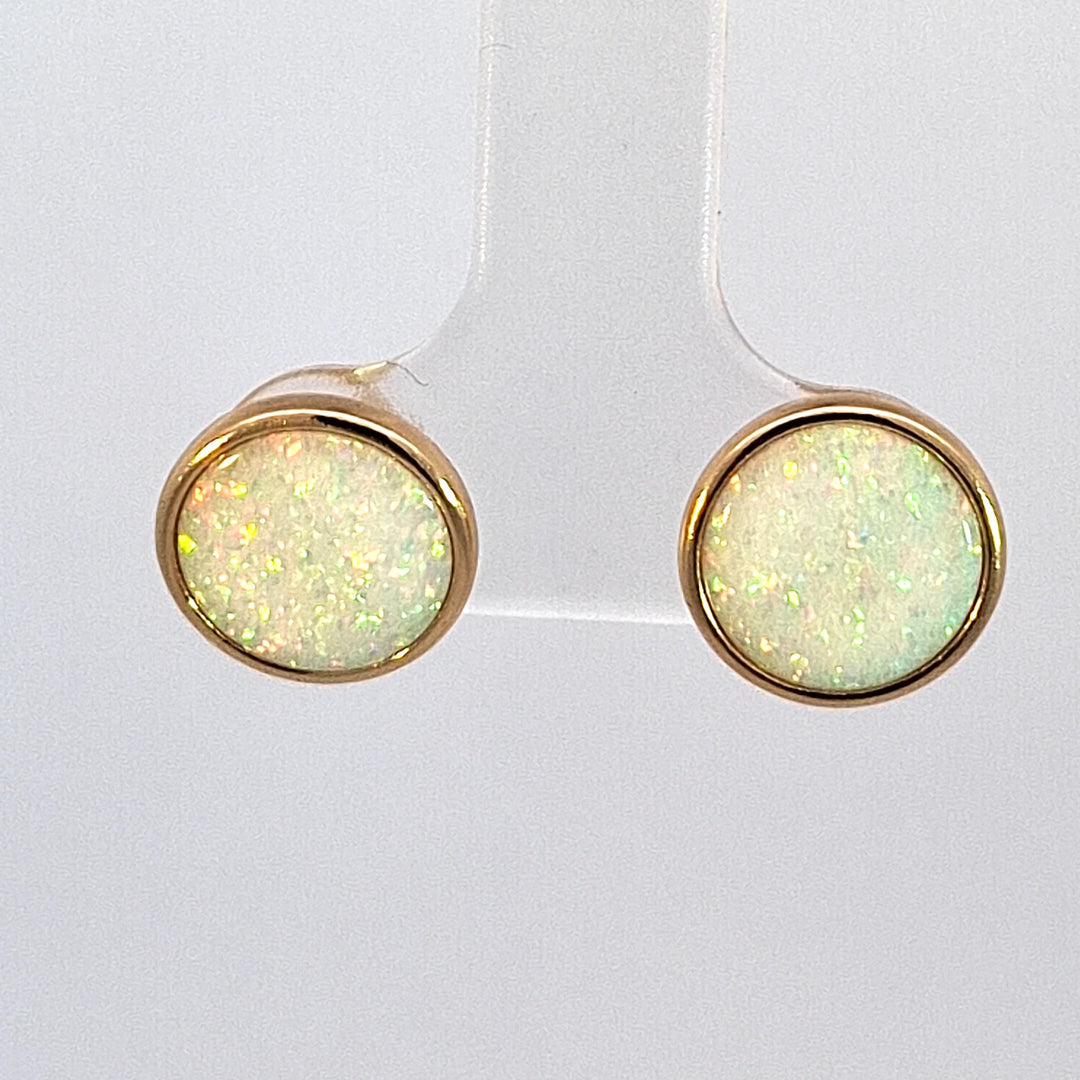 Gold tone created Opal stud earrings 38688