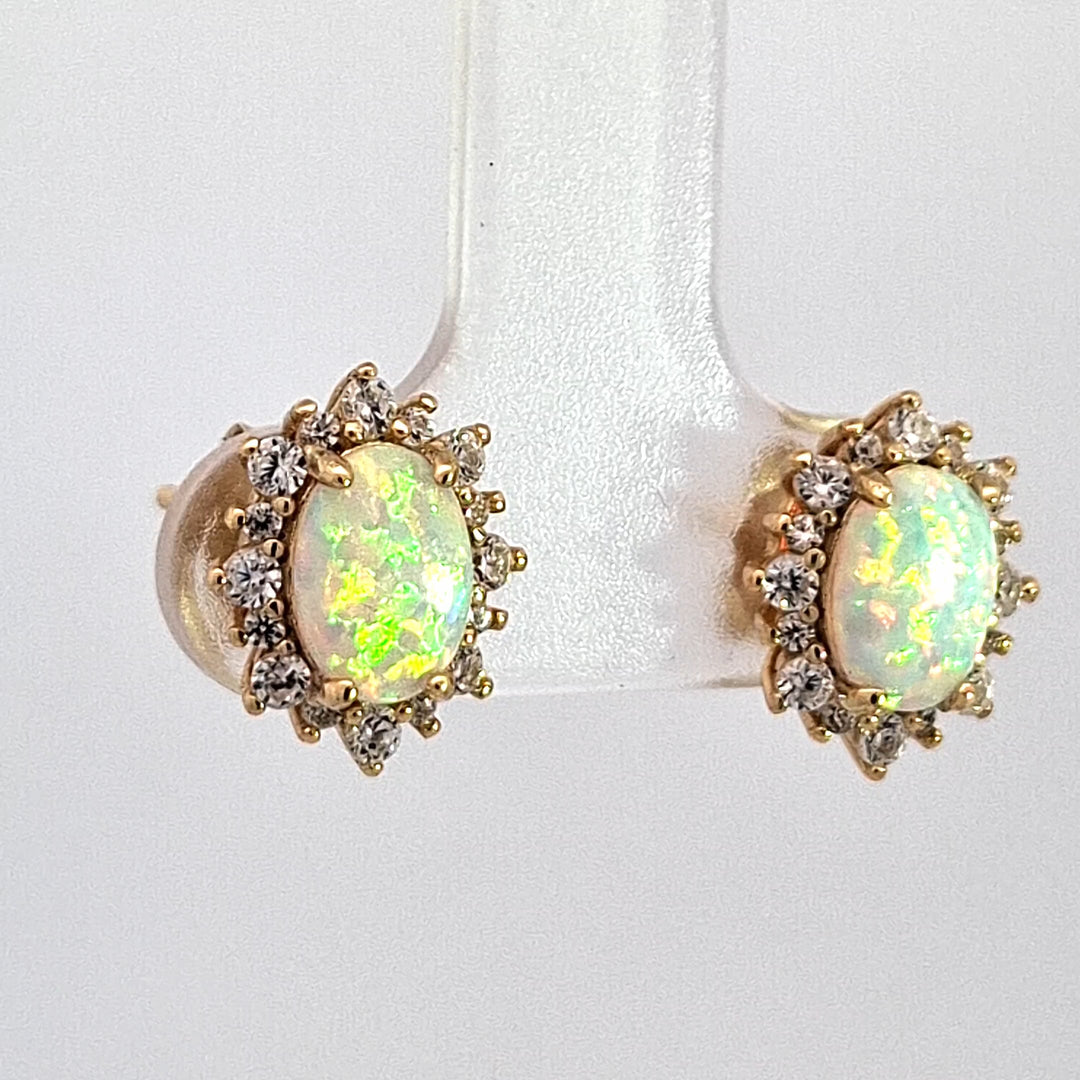 Oval created Opal Halo stud earrings 38690