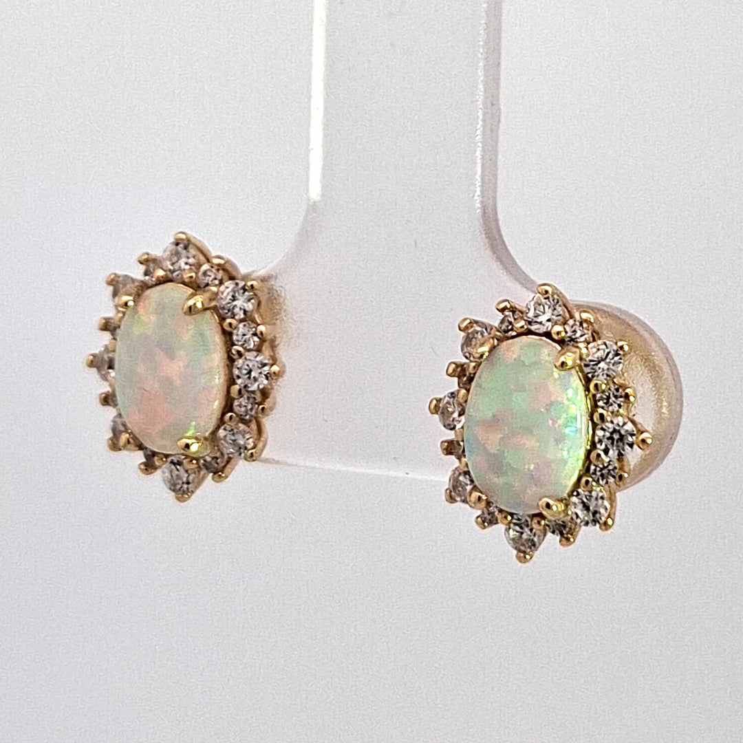 Oval created Opal Halo stud earrings 38690