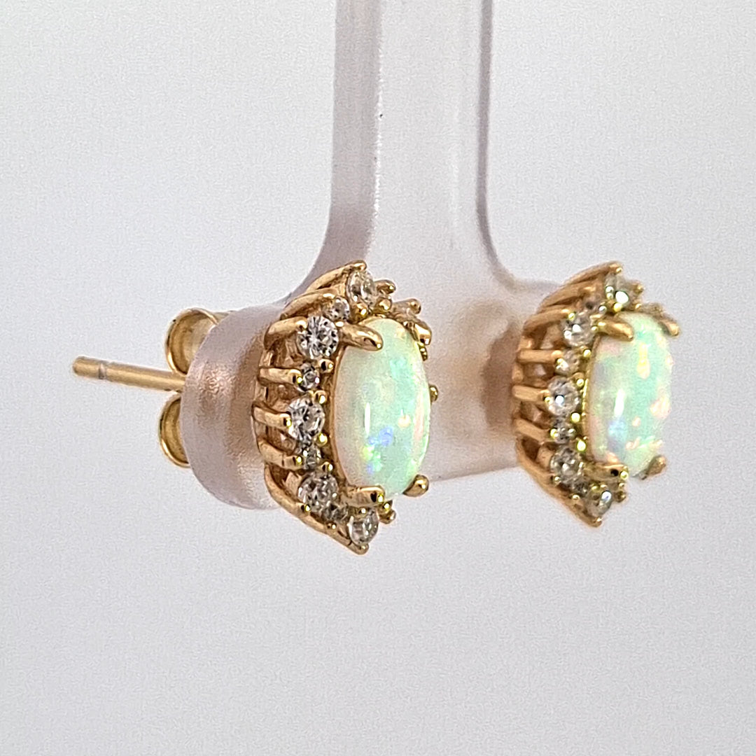 Oval created Opal Halo stud earrings 38690