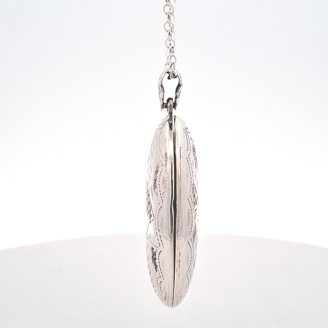 Large heavy oval silver locket 38726