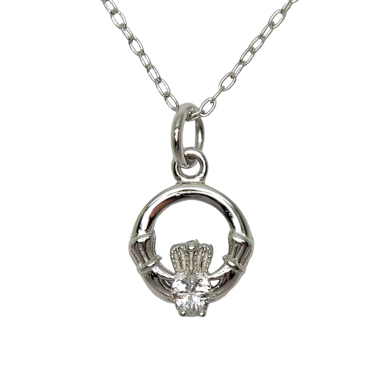 Silver claddagh pendant on a chain against a light gray background