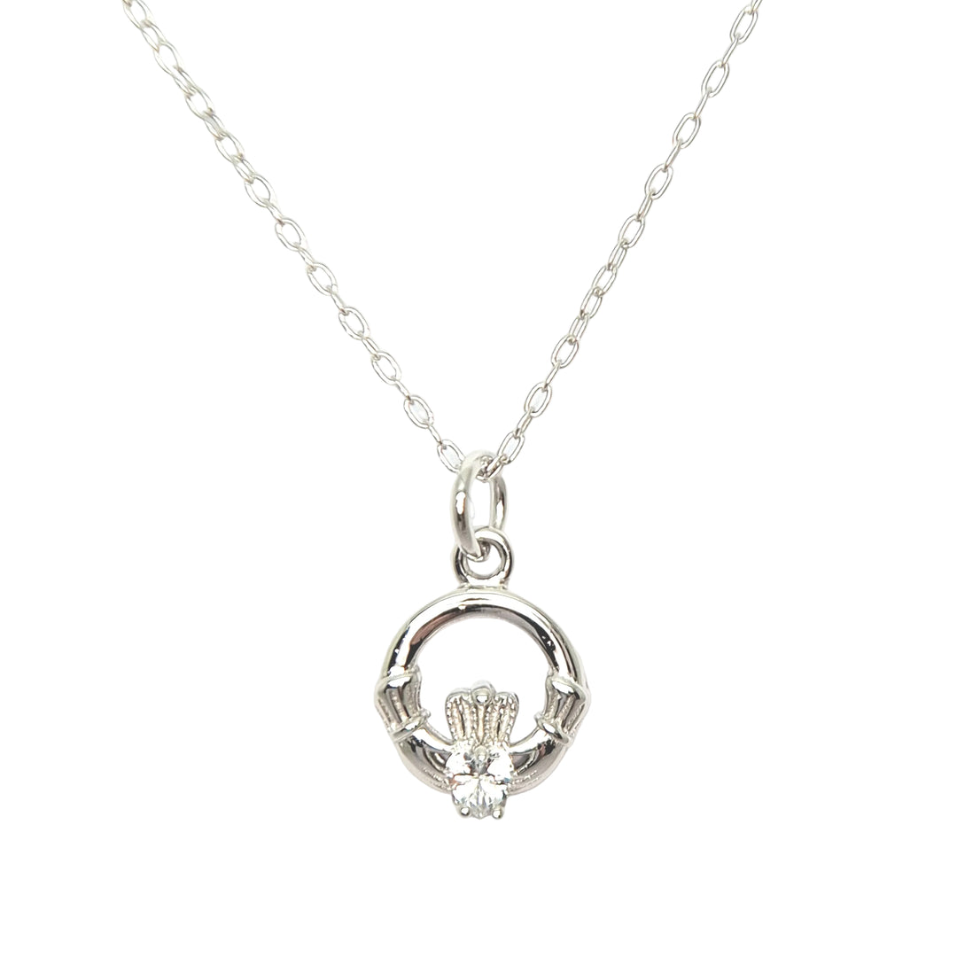 Silver Claddagh pendant necklace on a white background