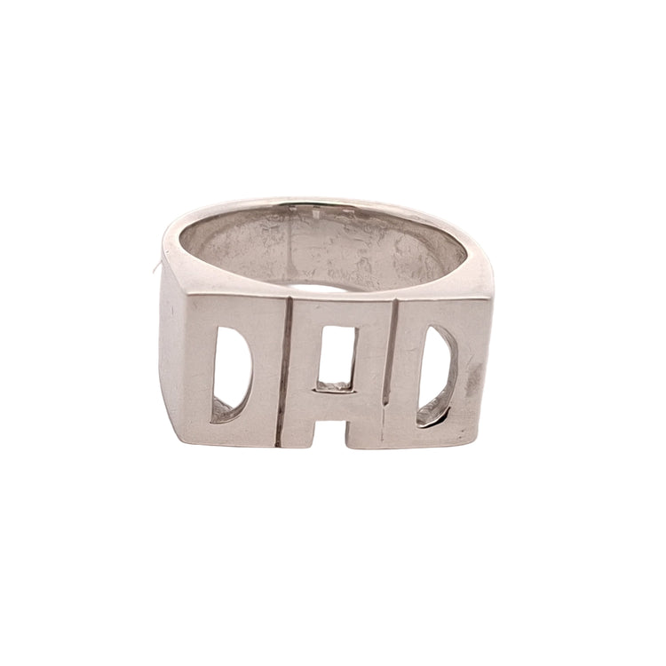 A sterling silver ring with the inscription 'DAD' on its exterior.