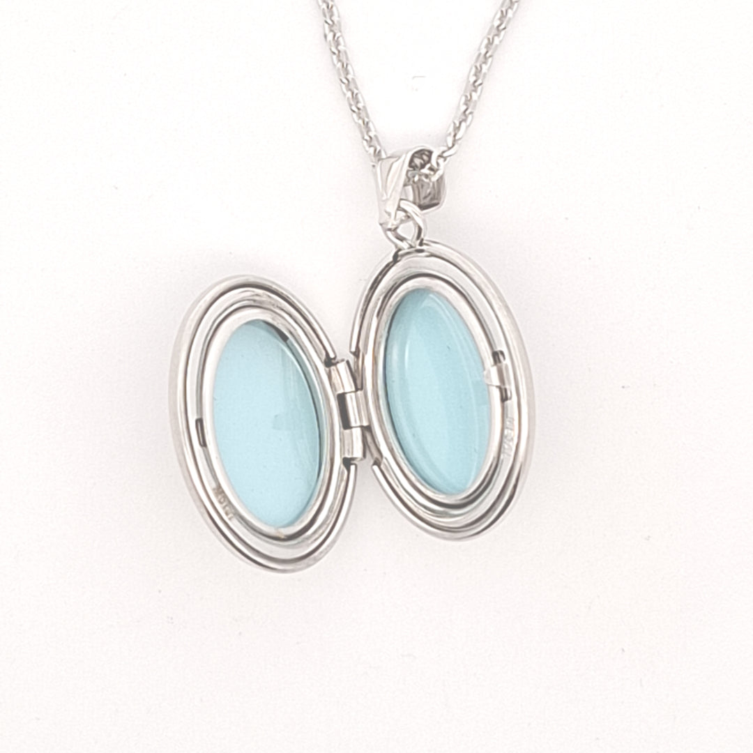 Silver oval Celtic locket on chain 37787