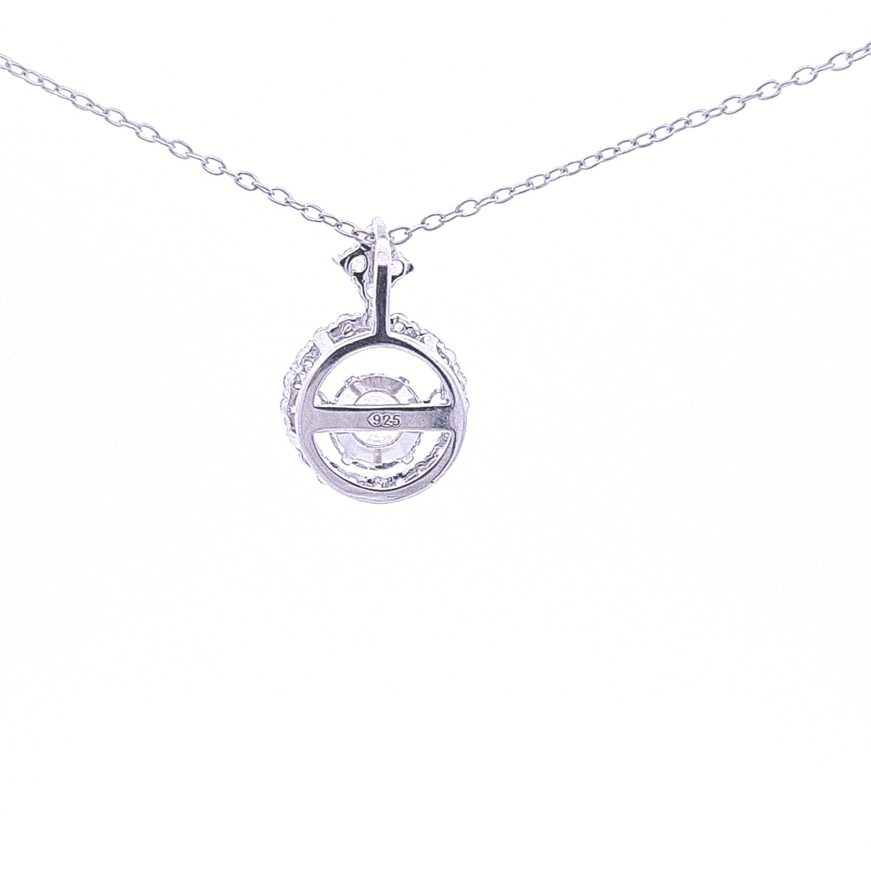 Sterling Silver Halo pendant where the centre stone is set on a spindle which makes the stone dance and shimmer! On 18"/46cm chain 33625 - Armin Lowe Jewellers