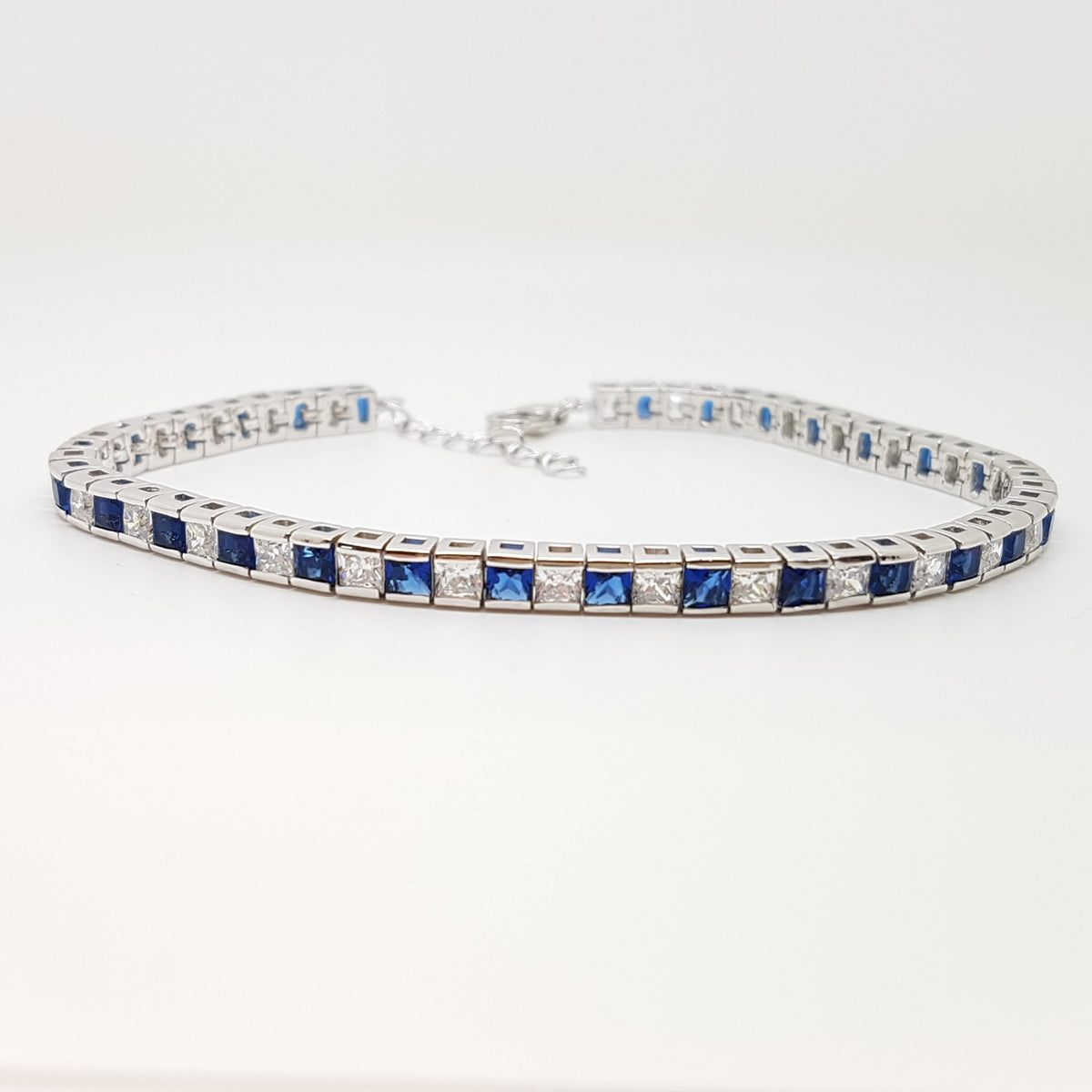 Sterling silver ladies Tennis style adjustable bracelet alternate set with square tennis  Blue sapphire CZ/CZ stones 33649 - Armin Lowe Jewellers