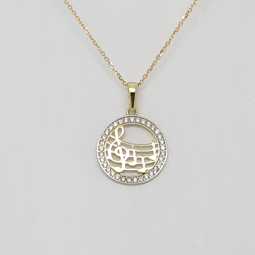 Music note pendant in 9ct yellow gold 34437 - Armin Lowe Jewellers