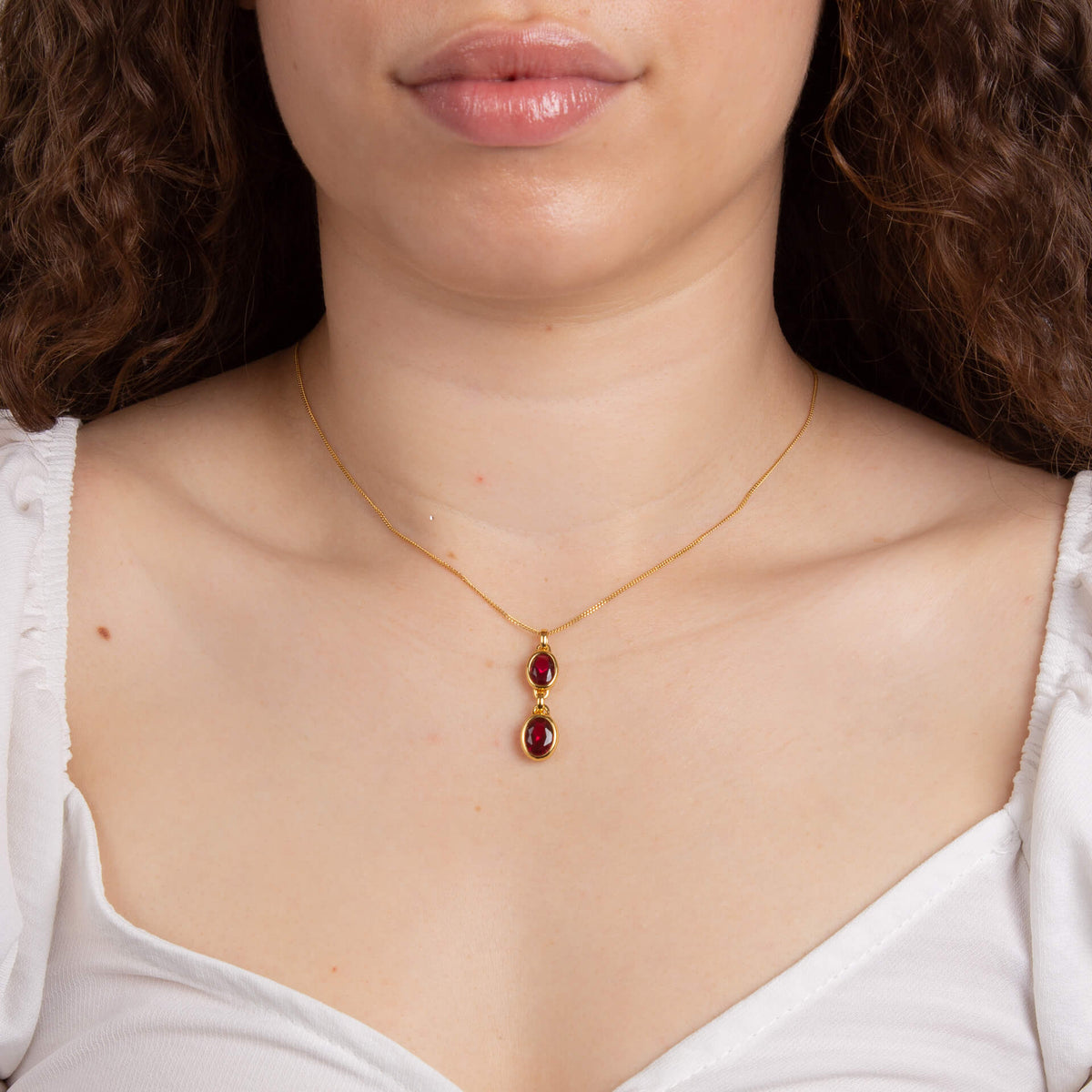 35695 Fiorelli Gold toned Fuchia crystal pendant - Armin Lowe Jewellers